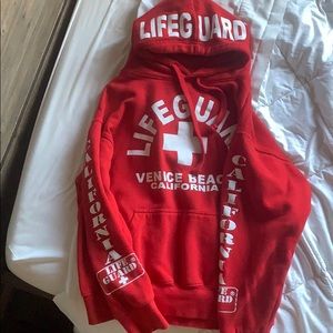 red lifeguard hoodie bought in Venice beach